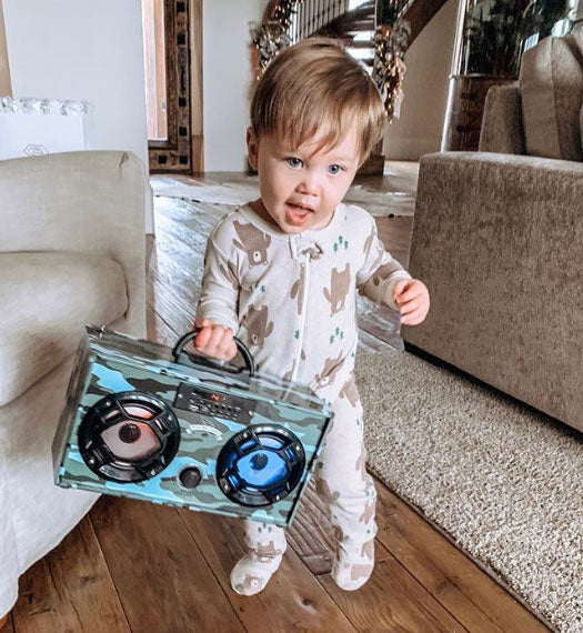 Brittany's little one with its favorite Boom Box